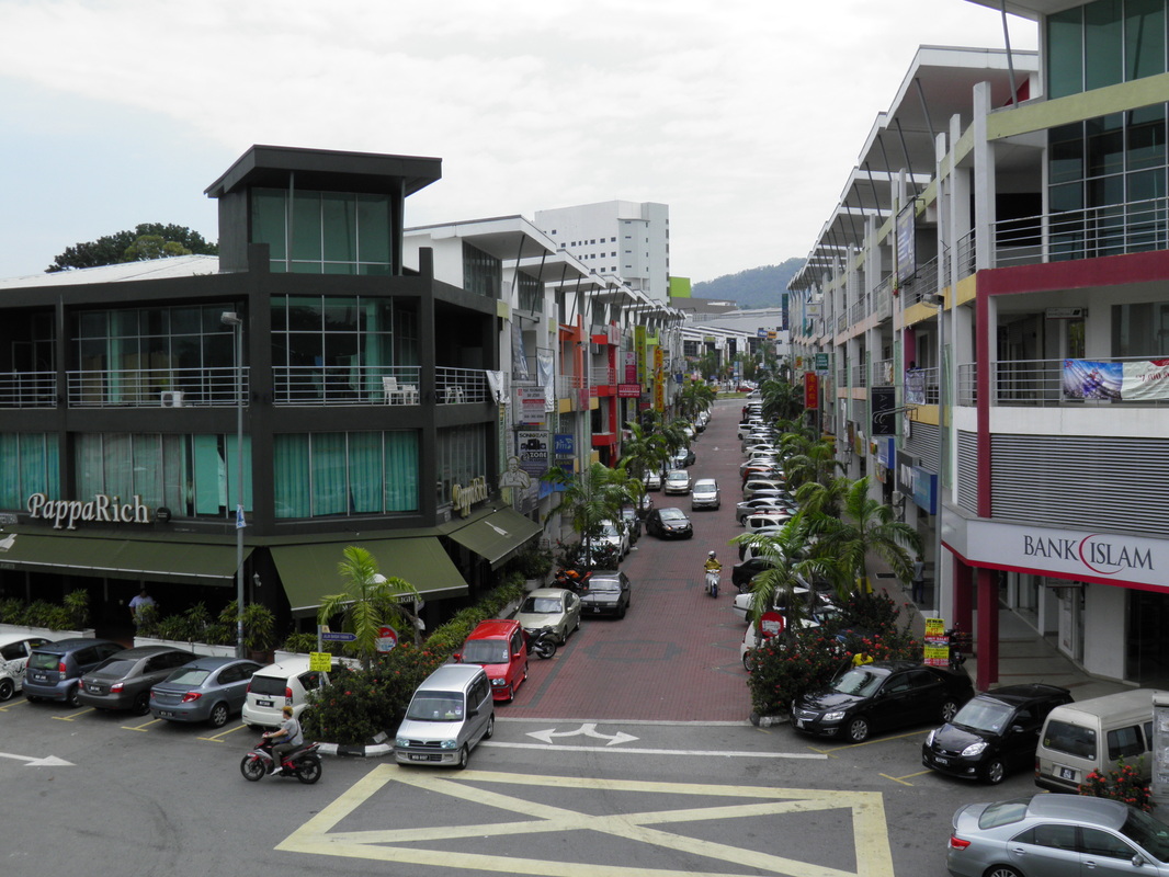 Modern shopping development in front of Rawang station.